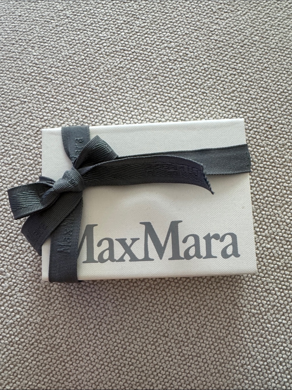 MaxMara code gift card for $150 off a $500 dolllar spend.